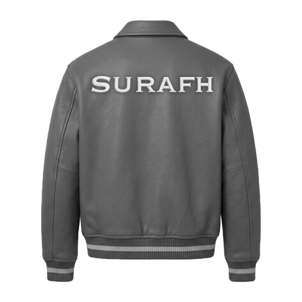 Factory flat lay rear view of the gray leather garment detailing industrial panel stitching and uniform bold embroidery execution.