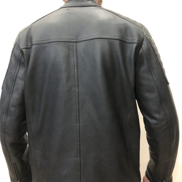 Back perspective of a private label black leather biker jacket showcasing premium central seam stitching and clean upper yoke panel construction.
