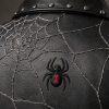Close-up of widow spider embroidery with red hourglass marking on gothic biker jacket