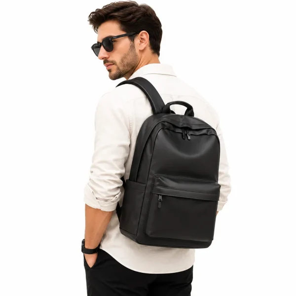 9 Man wearing black leather backpack on one shoulder, side view